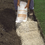 Install a Retaining Wall Crushed Rock behind the wall