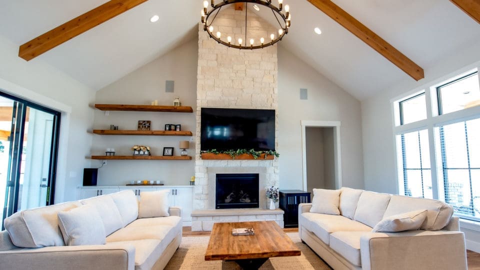 Fireplace faced with white mountain natural stone veneer