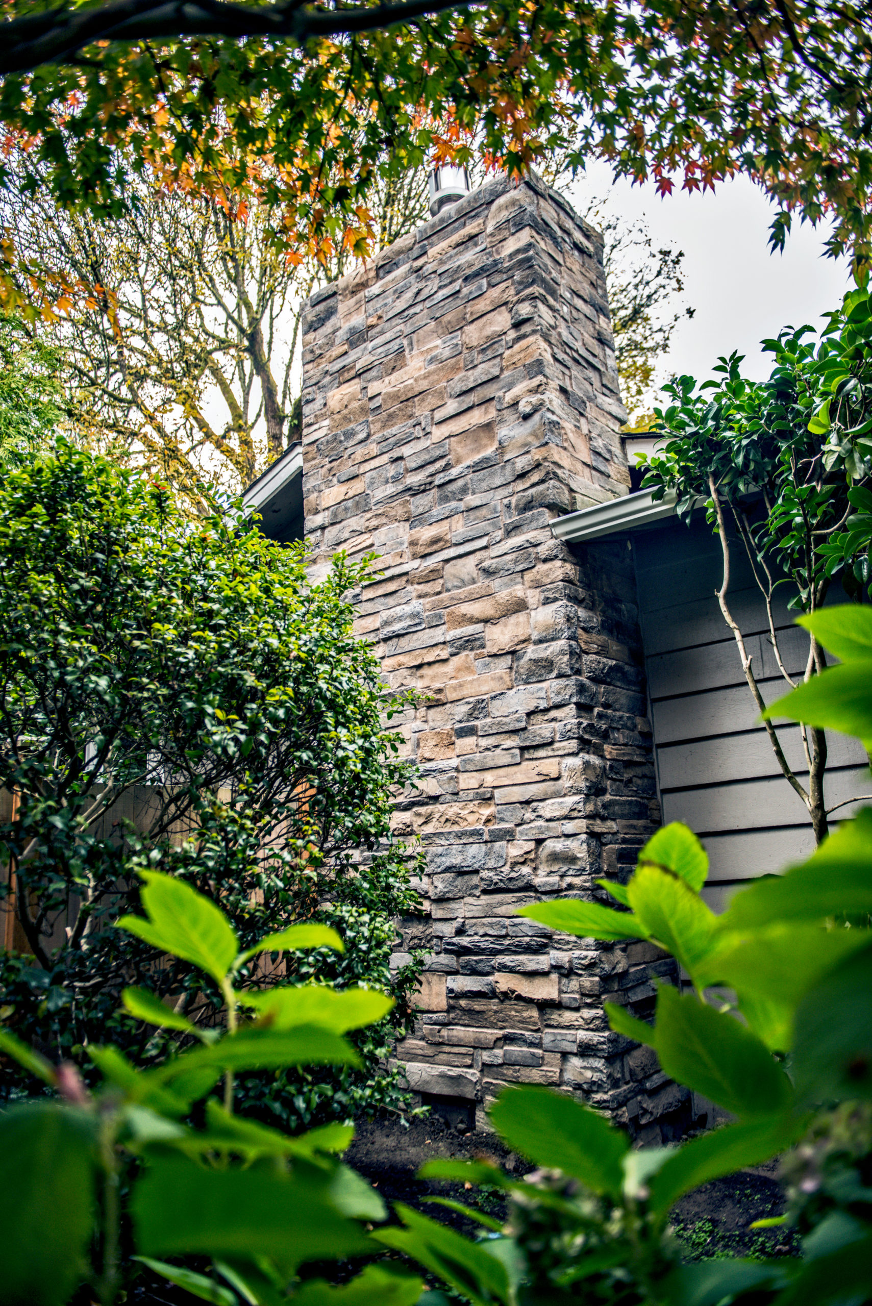 Chimney faced with Umber Creek Country Ledgestone from Cultured Stone