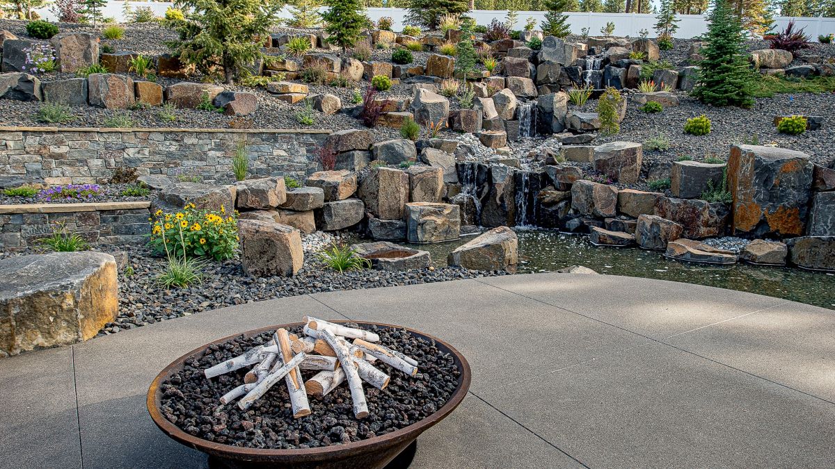 Outdoor water feature comprised of basalt boulders