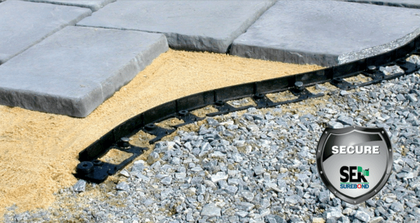 Low-profile paver edging around paver patio