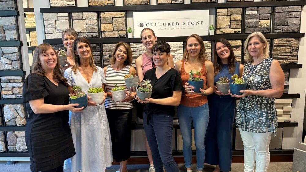 Participants in the Westlake Royal Stone Solutions succulent design class