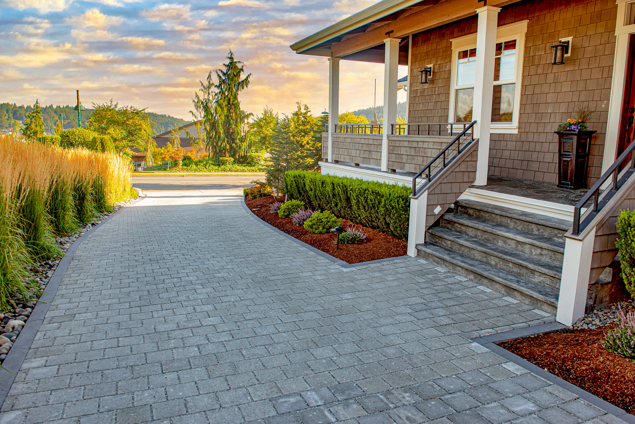 Permeable paver driveway alongside a house