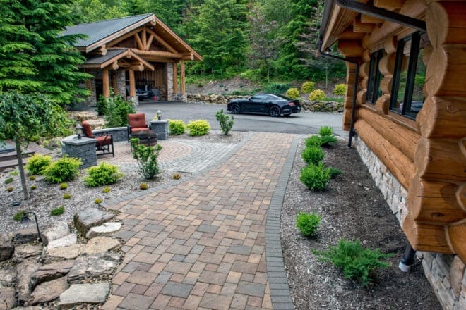 Dominion Slate concrete paver walkway leading to a driveway