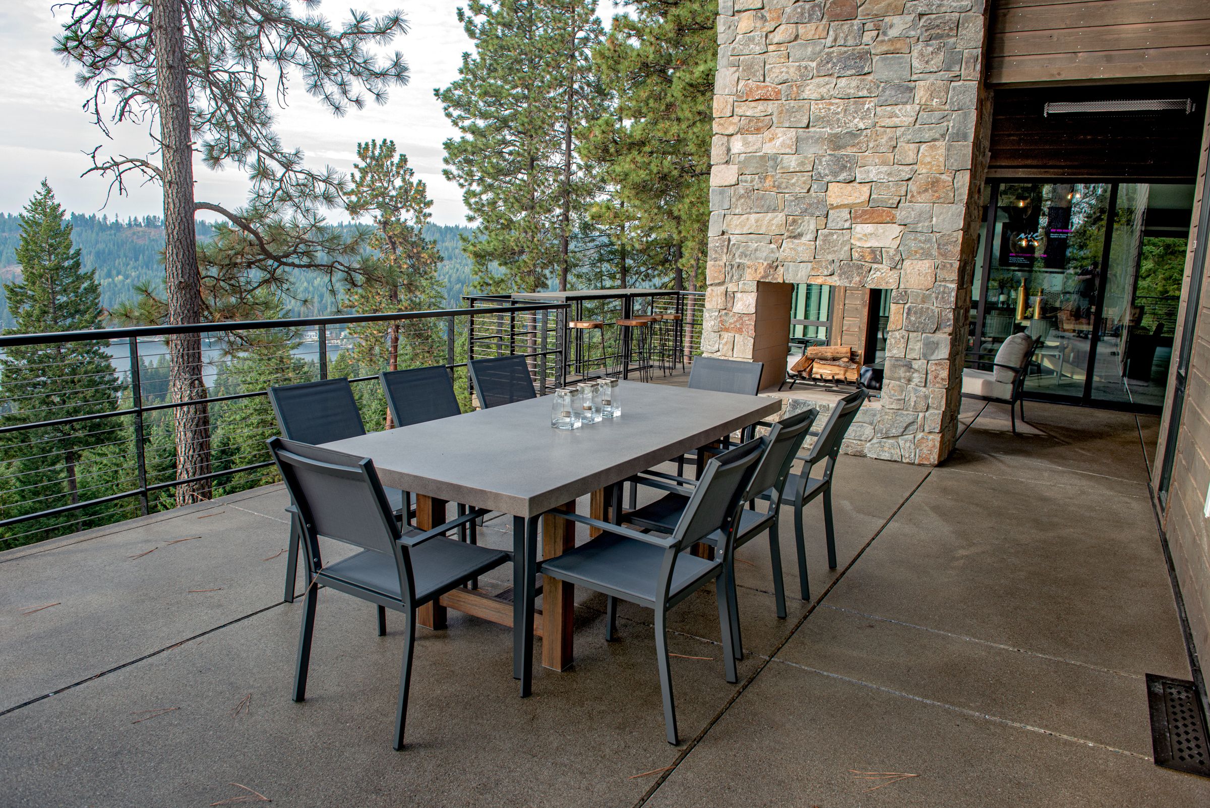 Double-sided fireplace faced with natural stone